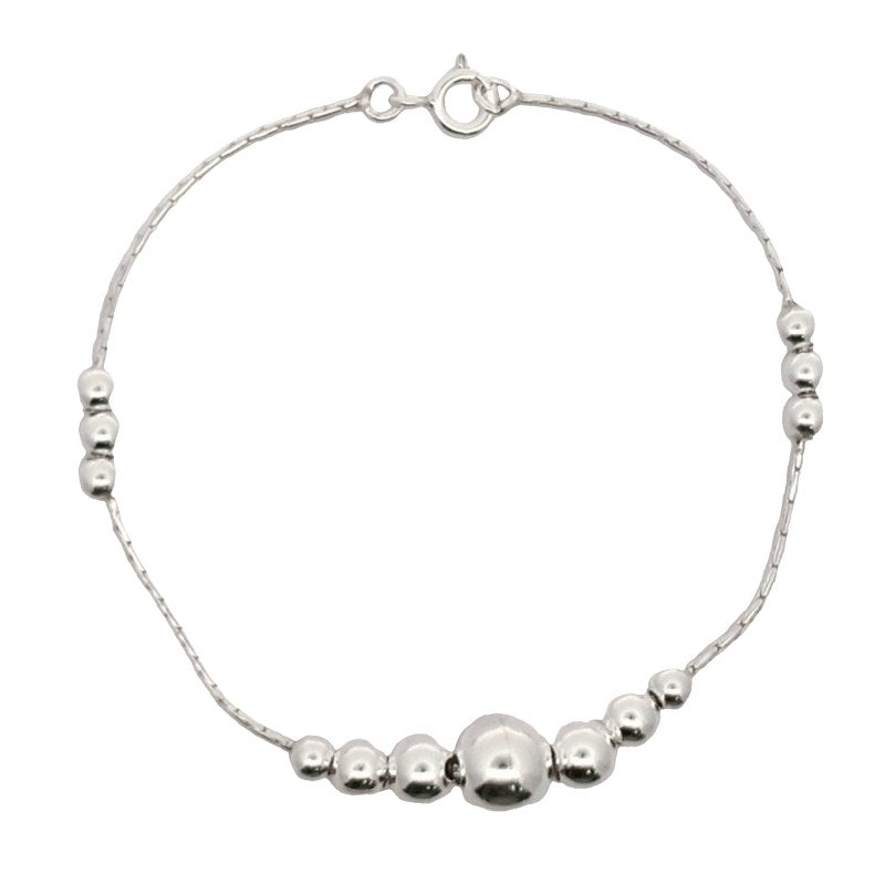 Pulsera con bolitas de plata