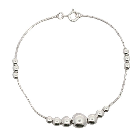 Pulsera con bolitas de plata